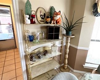 This folding shelf IS actually for sale… cool hand painted chicken on it and it folds totally flat, but is very sturdy when set up. Fox collection including a cookie jar and a sultan pepper set, rare green metal Willow trees and some Aggie glasses plus a very old pair of roller skates…