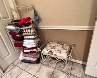 Towels and a cute Victorian style upholstered metal make-up stool