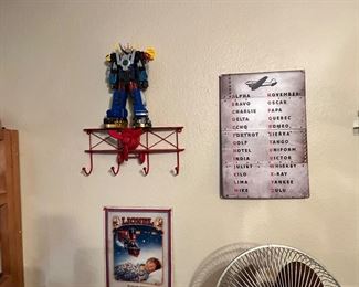 Uh… I guess that is Voltron wing walking as he practices for the air & stunt show… it must be a hard economy for a discarded cartoon robot from the 80’s. Invest wisely guys!