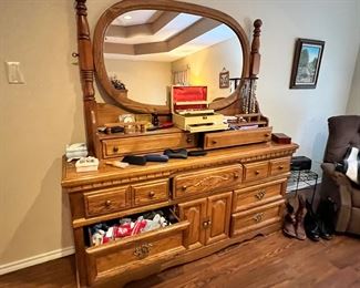Very nice real wood high-boy style vanity/dresser with lots of storage.