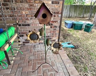 Metal bird house… probably going to a bird house flipper who will just repaint it grey and put it on Zillow at twice what they paid without even fixing the plumbing then end up getting a TV show you have watch while you wait at the doctors office. Why do doctors offices only show home renovation shows and bars only show sports?… Just once I want to walk into a bar and see people intently watching and rooting for a Home renovation show : “Woo, yeah; take out that wall and let in the natural light!”