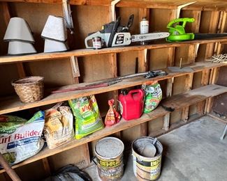 Craftsman chainsaw and an electric blower.