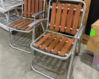 Pair of wooden slat folding lawn chairs