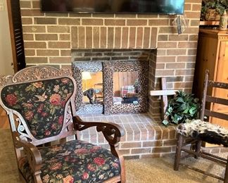 Antique rocker and cowhide ladder back chair