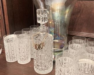 Consigned barware - one of five decanters and some of the glasses