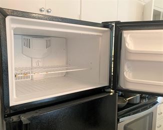 Black Frigidaire refrigerator/ freezer