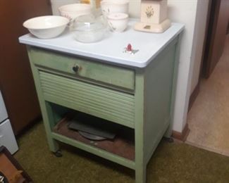 Vintage roll front cabinet