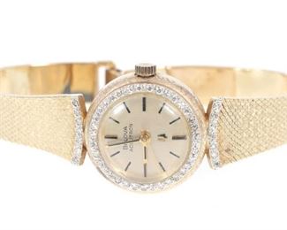 LADIES BULOVA ACCUTRON 14K GOLD DIAMOND WRIST WATCH