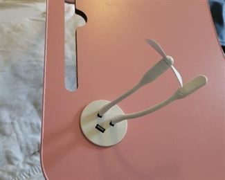 Cool bed table.  I wish I could lay in bed all day and work like this, BUT NO, my office requires me to be in my home office so they can see my pretty face..And when you see my pretty face you will know it's a joke.  I look like a Gargoyle gone bad,