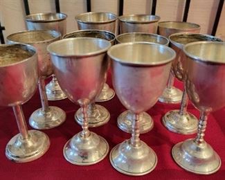 Silver goblets, that's how my servants bring me my wine after they have helped me out of the chair, tub, car, kitchen table, off the toilet, etc.  One time my servant brought it too me at a party that I didn't even know I was attending.  I think it was Alice Walton's house.  What a night.