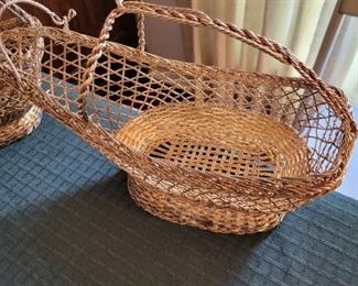 Wine baskets.  Necessary for any household.  My servants are instructed to use them or they will have a bad manicure in the basement. With no ventilation.  Or water.  I do hand out Depends though.  I feel it's my duty to June Allisson, or whatever the heck her name was.  God, I hope she doesn't come to the sale.