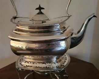 Tipping Teapot..It does not tip you though