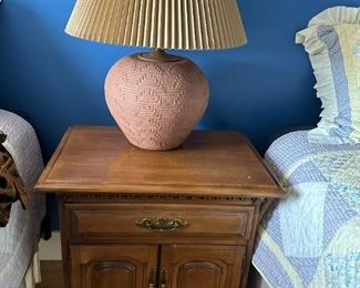 Night stand with earthen lamp