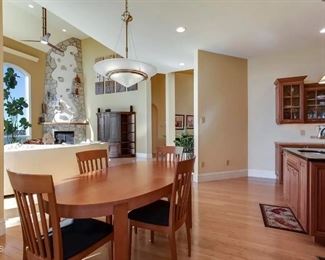 kitchen table with four chairs and leaf
