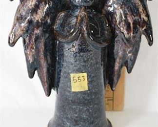 Signed pottery angel