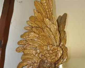 A 9 1/2 foot tall single piece  carved wood artwork by David  Elder.  Title:  Winged Victory