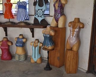 Asst. carved wood torsos and figures created by David Elder.