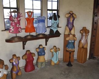 Asst. carved wood torsos and figures created by David Elder.