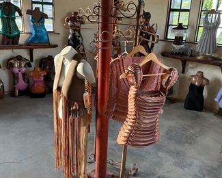 Asst. carved wood torsos and figures created by David Elder.