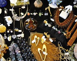 A fabulous collection of Fine jewelry priced at Bargains basement levels.  All jewelry sales are fully guaranteed to be "as described" and real values or your money refunded.