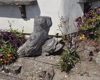 Carved wood winged torsos/figures created by David Elder.