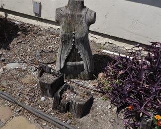 Carved wood torsos/figures created by David Elder.