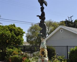 A 20 Foot tall Totem Pole - TRIBUTE TO THE CHUMASH NATION created jointly by David and Linda Elder will greet you as enter the residence.