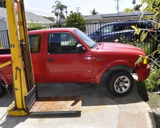 2003 Ford Ranger long bed with V6 - 215,000 miles.  Runs good with good tires and priced right.