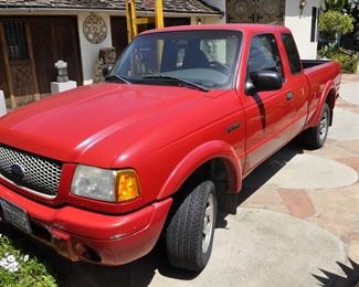 2003 Ford Ranger long bed with V6 - 215,000 miles.  Runs good with good tires and priced right.
