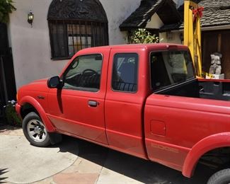 2003 Ford Ranger long bed with V6 - 215,000 miles.  Runs good with good tires and priced right.