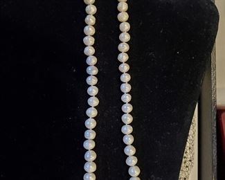 22" real pearl necklace, although  I don't have the pearl size.