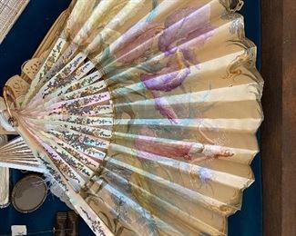 Antique French handpainted and signed mother of pearl and sterling fan