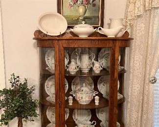 Early oak curio cabinet with curved etched glass