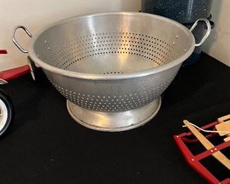 Large metal commercial colander