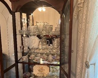 Lighted cherry curio cabinet