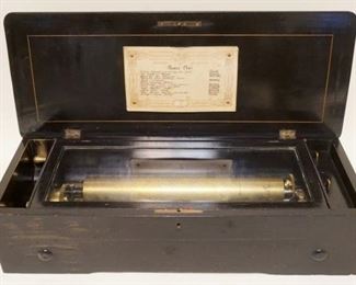 1011	SWISS MUSIC BOX LANGDORFF & FILS W/INLAID TOP, APPROXIMATELY 9 IN X 22 1/2 IN X 6 IN HIGH
