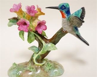 1024	J.T. JONES STAFFORDSHIRE HUMMING BIRD PORCELAIN FIGURE, APPROXIMATELY 6 IN HIGH
