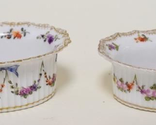 1039	PAIR OF GERMAN PORCELAIN OVAL SALTS, APPROXIMATELY 2 1/2 IN X 3 1/2 IN X 1 1/2 IN HIGH
