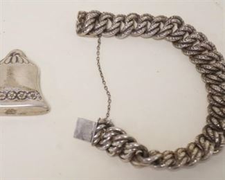 1042	STERLING SILVER BRACELET & BELL SHAPED PIECE, 1.45 OZT
