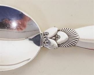 1055	GEORG JENSEN CACTUS PATTERN STERLING SPOON, 0.87 OZT, APPROXIMATELY 4 IN
