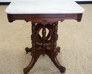 1094	WALNUT VICTORIAN MARBLE TOP TABLE, APPROXIMATELY 20 IN X 28 IN X 30 IN HIGH
