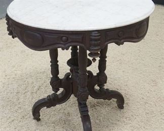 1100	ORNATE WALNUT VICTORIAN ROUND MABLE TOP PARLOR TABLE, APPROXIMATELY 30 IN X 30 IN HIGH
