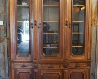 1106	WALNUT VICTORIAN 2 PART BOOKCASE HAVING 3 DRAWERS & 6 DOORS, APPROXIMATELY 67 IN X 19 IN X 93 IN HIGH, LOSS TO MOLDING
