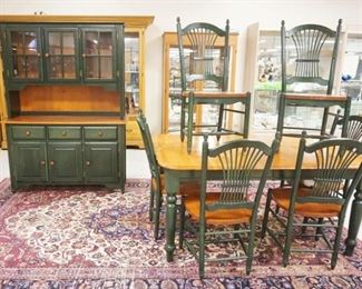 1142	DINETTE SET INCLUDING TABLE WITH 1 LEAF APPROXIMATELY 42 IN X 64 IN X 30 IN H, 6 CHAIRS AND HUTCH 53 IN X 18 IN X 73 IN H. TABLE TOP HAS SURFACE WEAR
