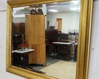 1149	WALL MIRROR IN ROUND OAK FRAME, APP 35 IN
