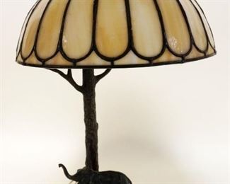 1197	BRONZE ELEPHANT & TREE TABLE LAMP W/SLAG GLASS PANELED SHADE, APPROXIMATELY 17 IN HIGH
