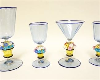 1225	ASSORTED GLASSES HAVING BLUE GLASS WITH GOLD FLECK AND APPLIED FLOWERS ON STEMS, TALLEST APPROXIMATELY 7 IN
