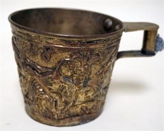1229	ANTIQUE HANDMADE BRASS EMBOSSED CUP WITH IMAGES OF BUCKING BULL AND STEER, APPROXIMATELY 3 IN H
