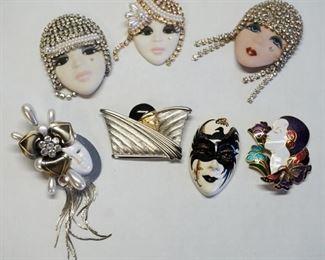 1276	LOT OF COSTUME BROOCH/PINS INCLUDES 3 PORCELAIN FACE PINS, 2 ARE SIGNED LOIS, ONE IS MARKED PORCELAIN FACES BY ELVIRA & JACKIE
