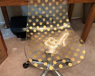 Close-up view of acrylic desk chair